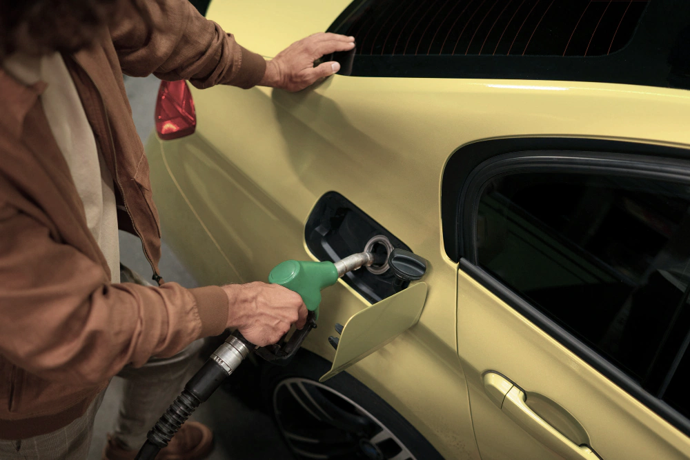 Customer charging an electric vehicle
